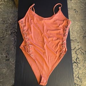 rust orange spaghetti strap body suit